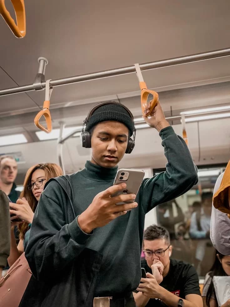Person on a train, representing everyday life that Kove helps you budget around